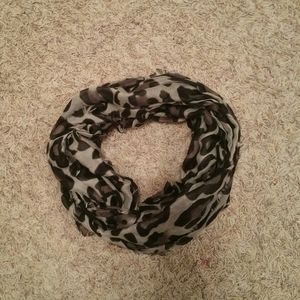 Gery, black, and tan cheetah print scarf